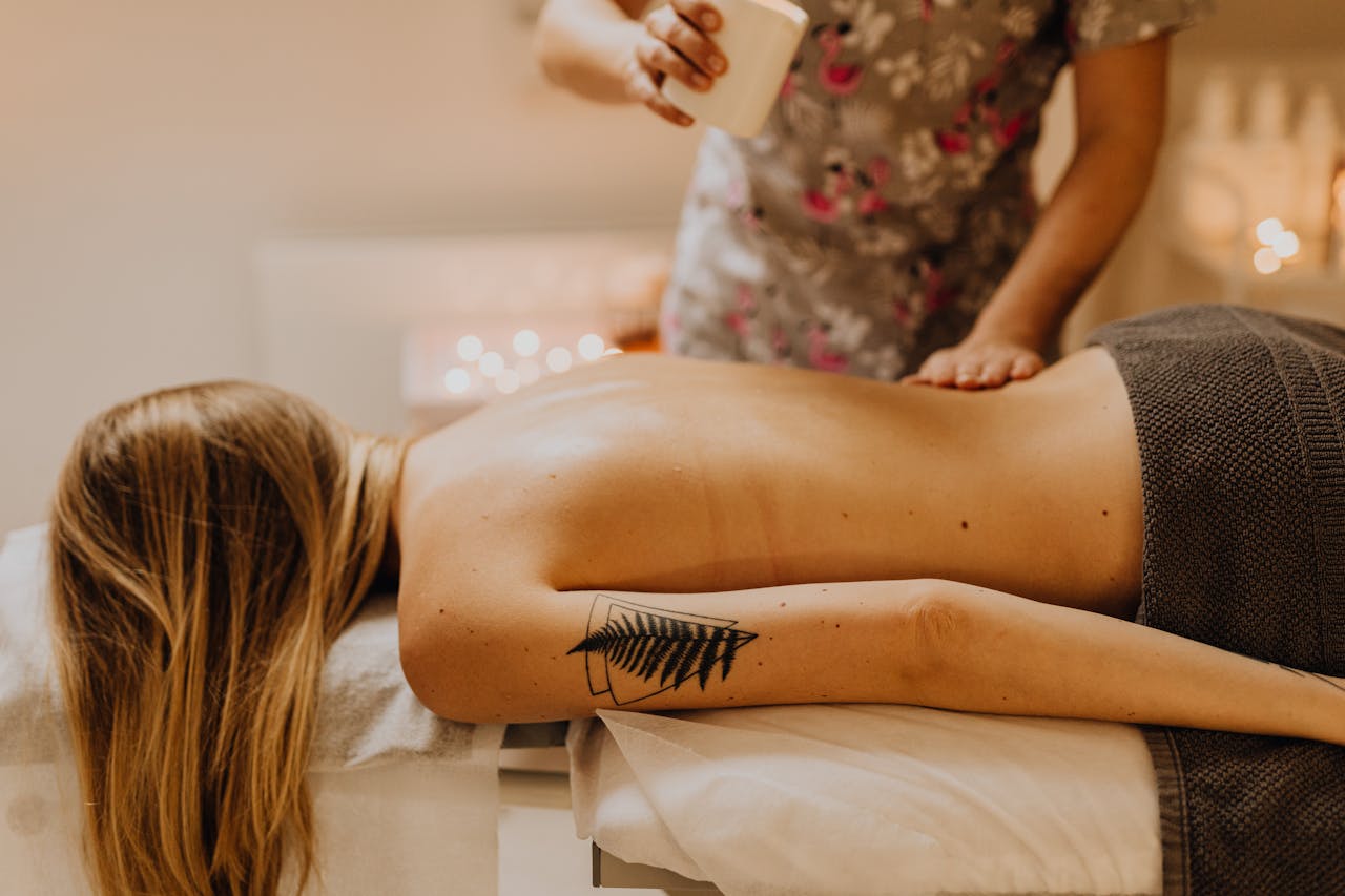 A serene spa massage capturing relaxation and therapy with a professional masseuse.